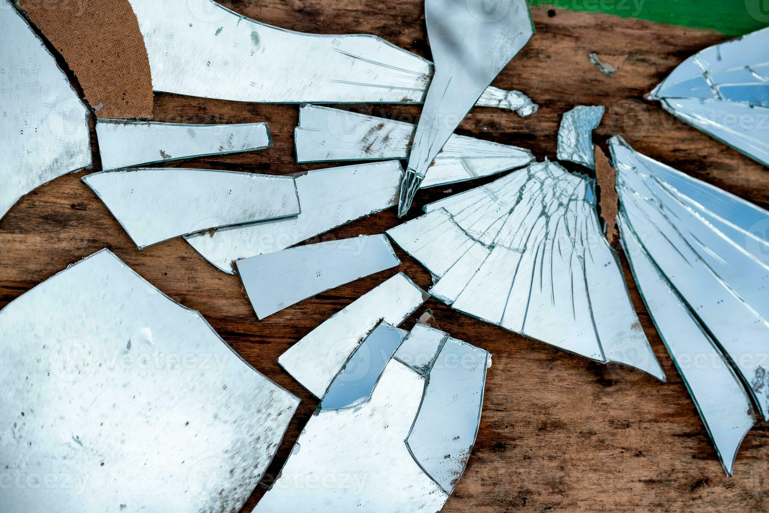 shards of a broken mirror close up 36152873 Stock Photo at Vecteezy