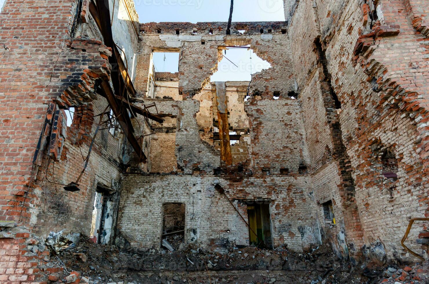 destroyed and burned houses in the city Russia Ukraine war photo