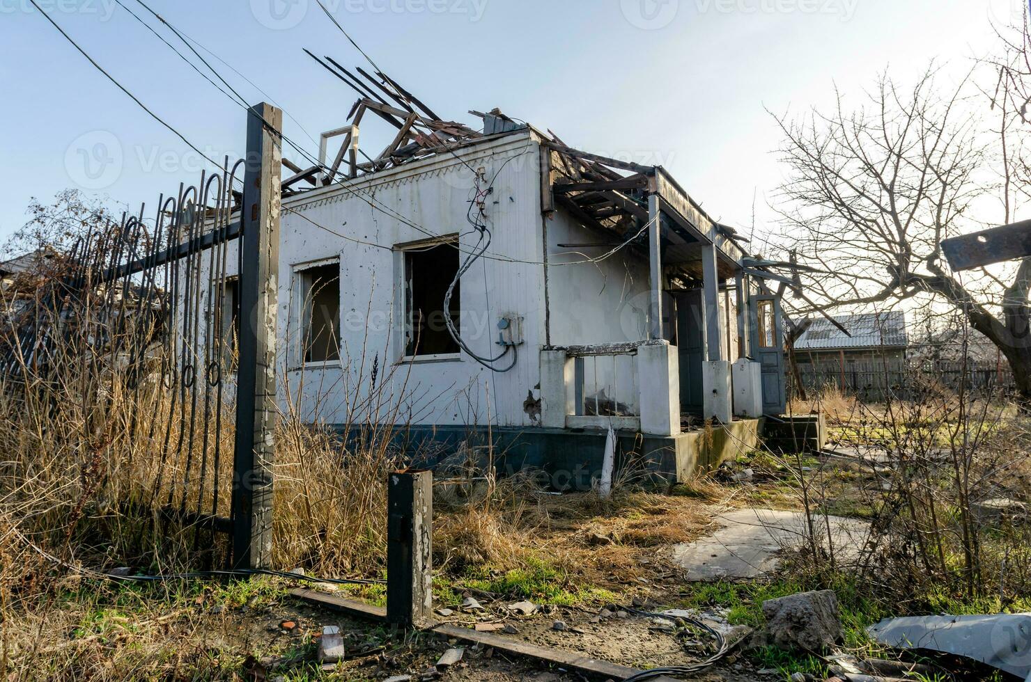 destroyed and burned houses in the city Russia Ukraine war photo