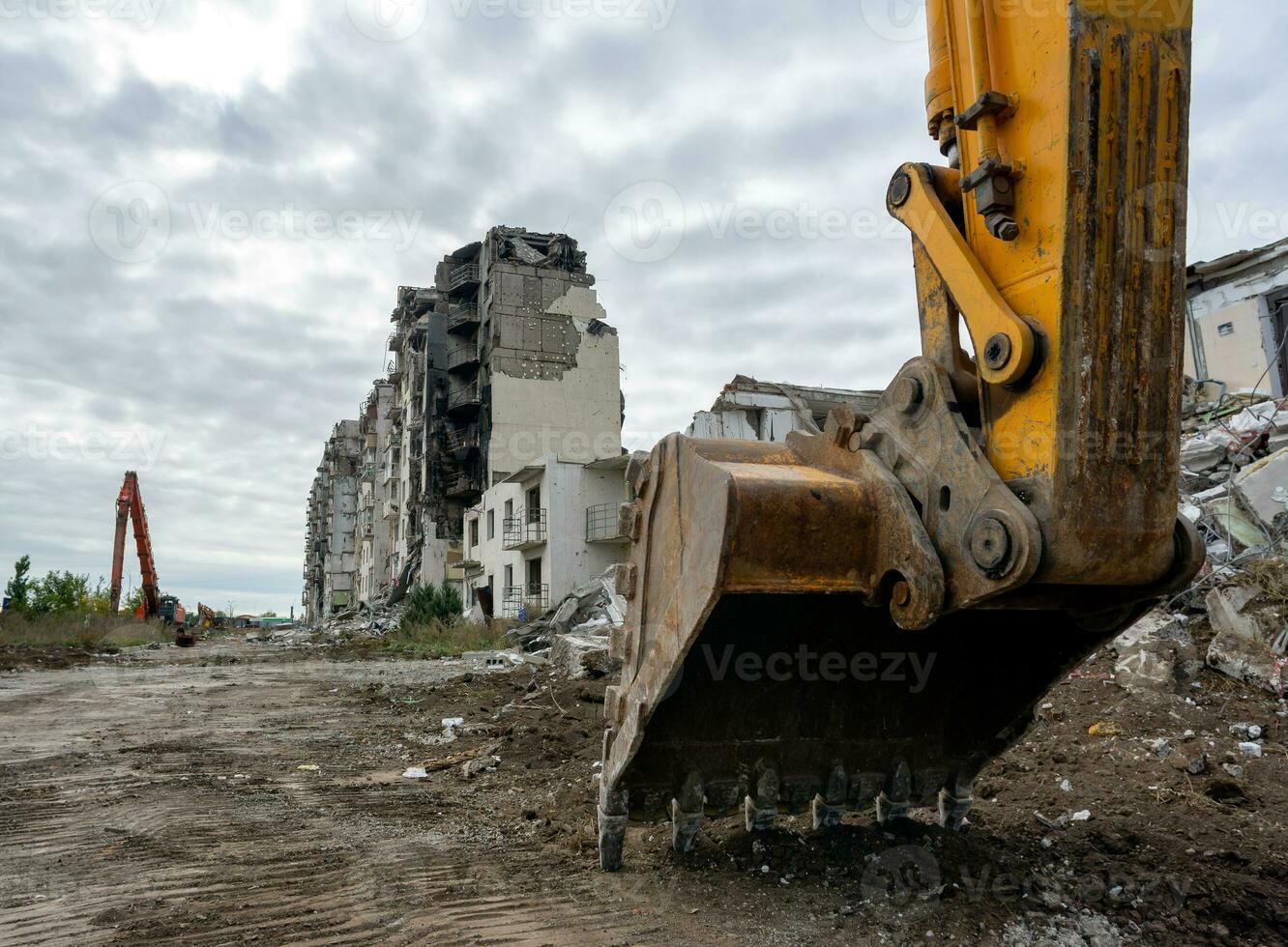 destroyed and burned houses in the city during the war in Ukraine photo