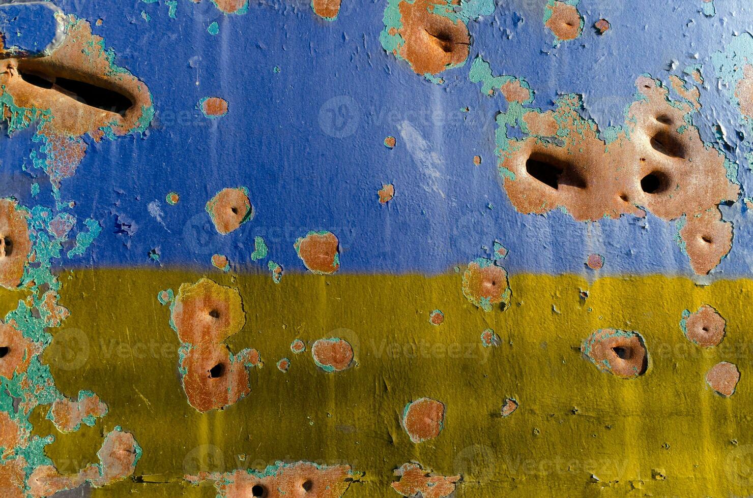 explosion damaged blue yellow wall war in Ukraine photo