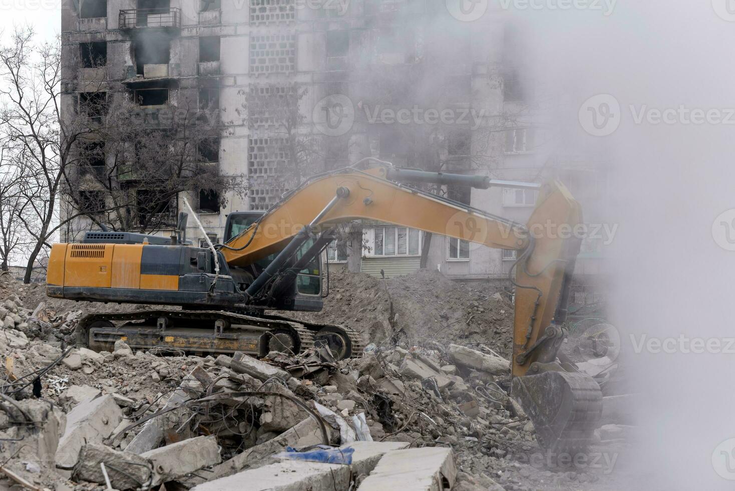 construction equipment destroys affected houses war in Ukraine photo