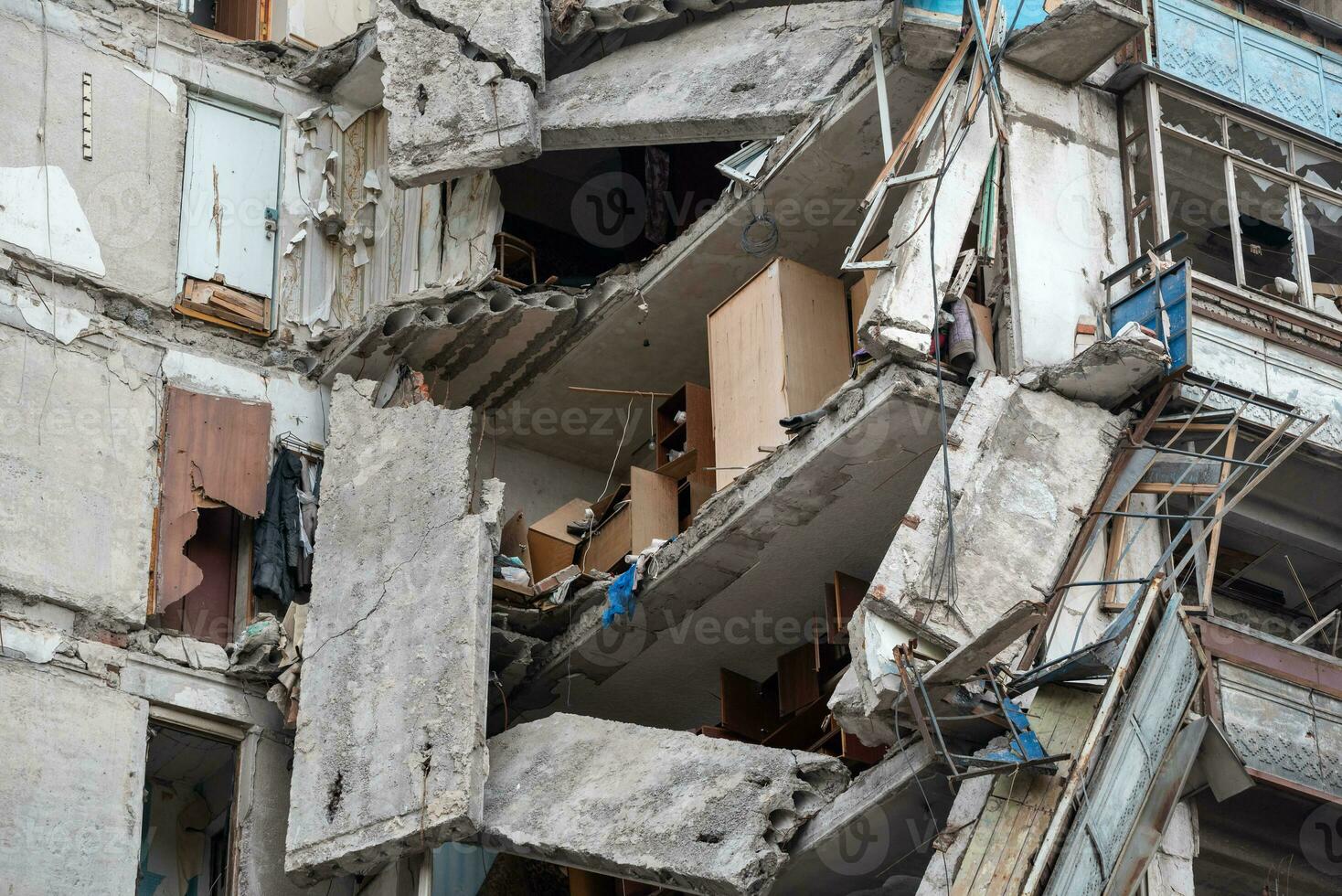 destroyed and burned houses in the city during the war in Ukraine photo