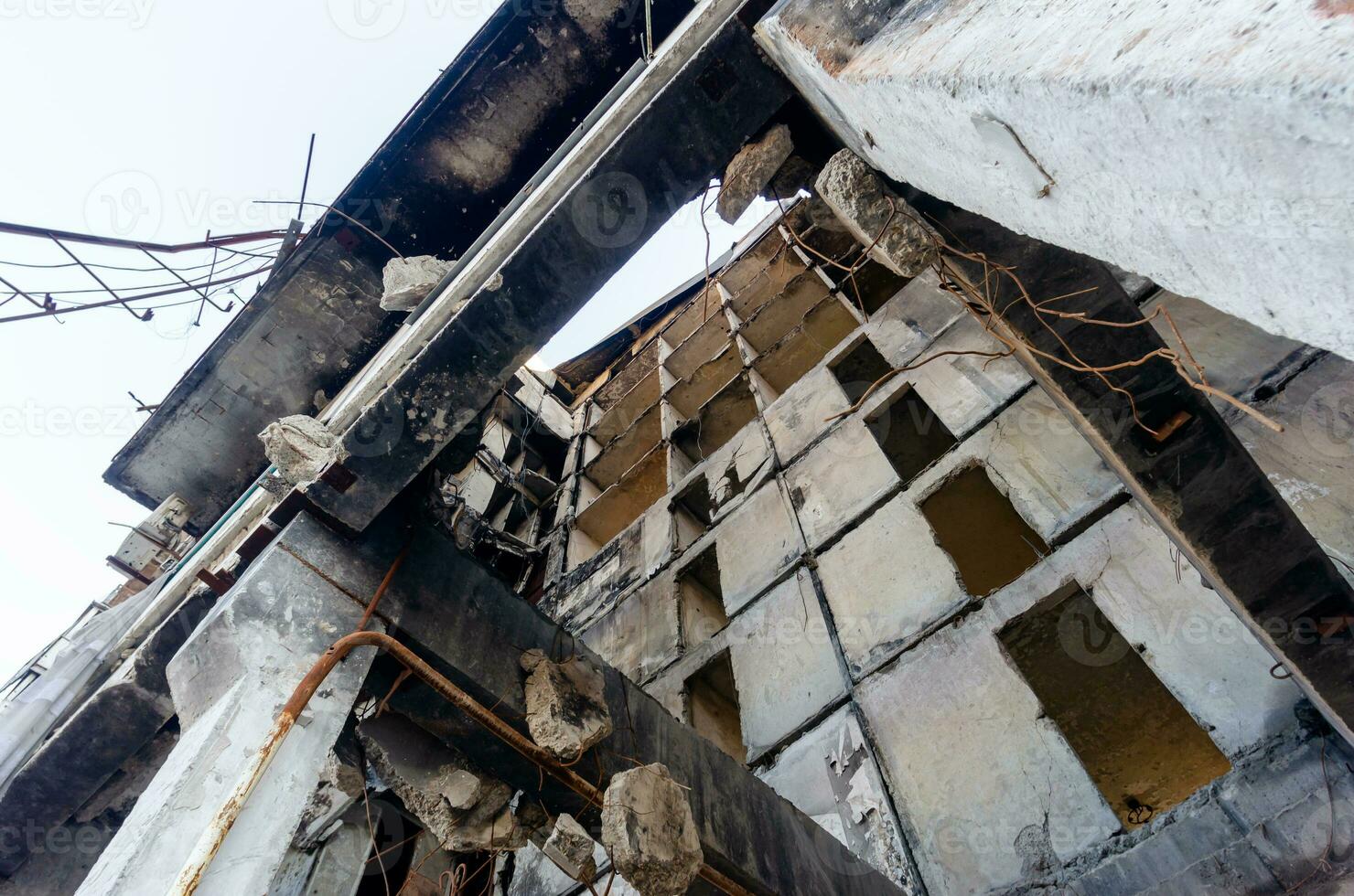 destroyed and burned houses in the city Russia Ukraine war photo