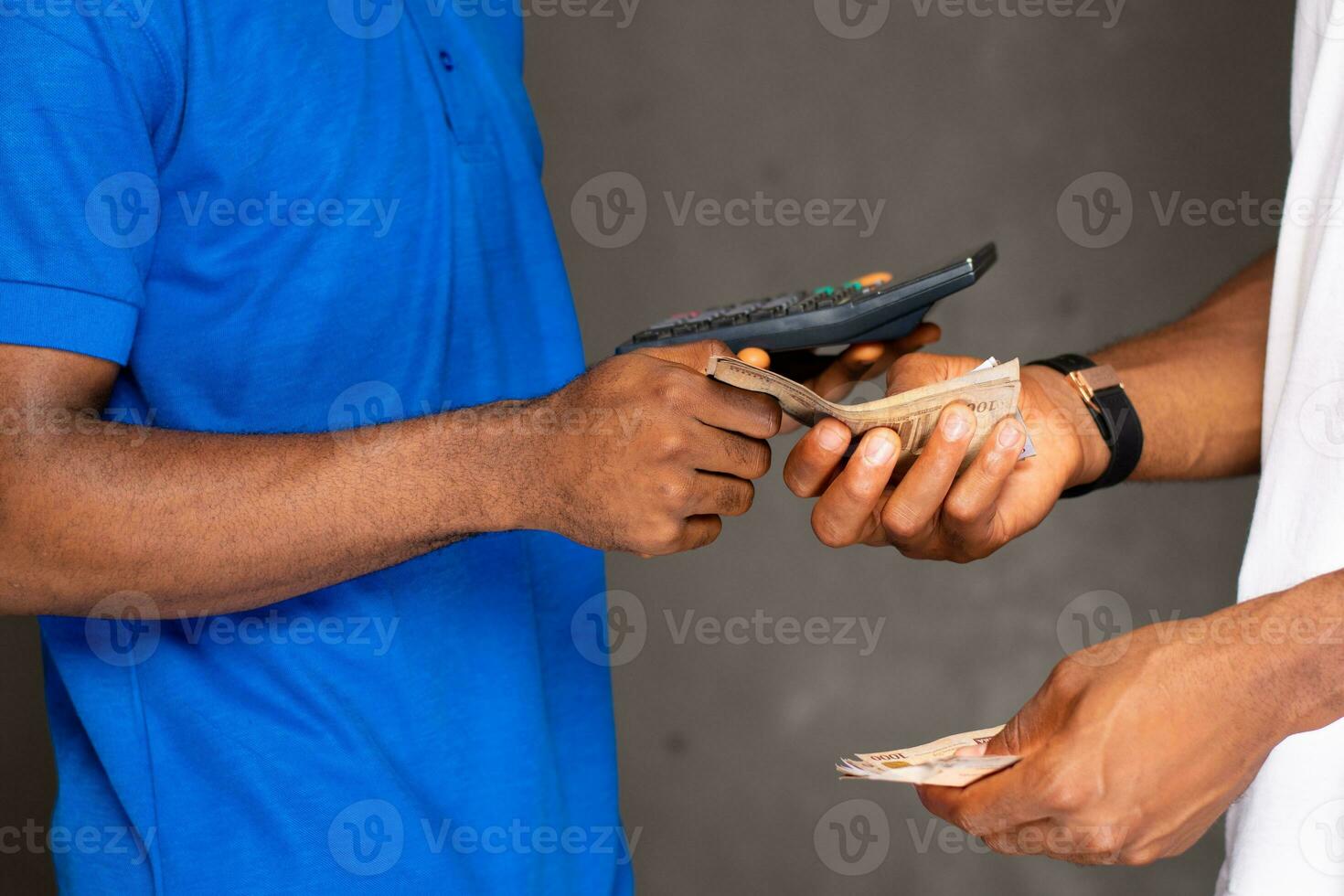 person giving someone money, payment, business transaction concept photo