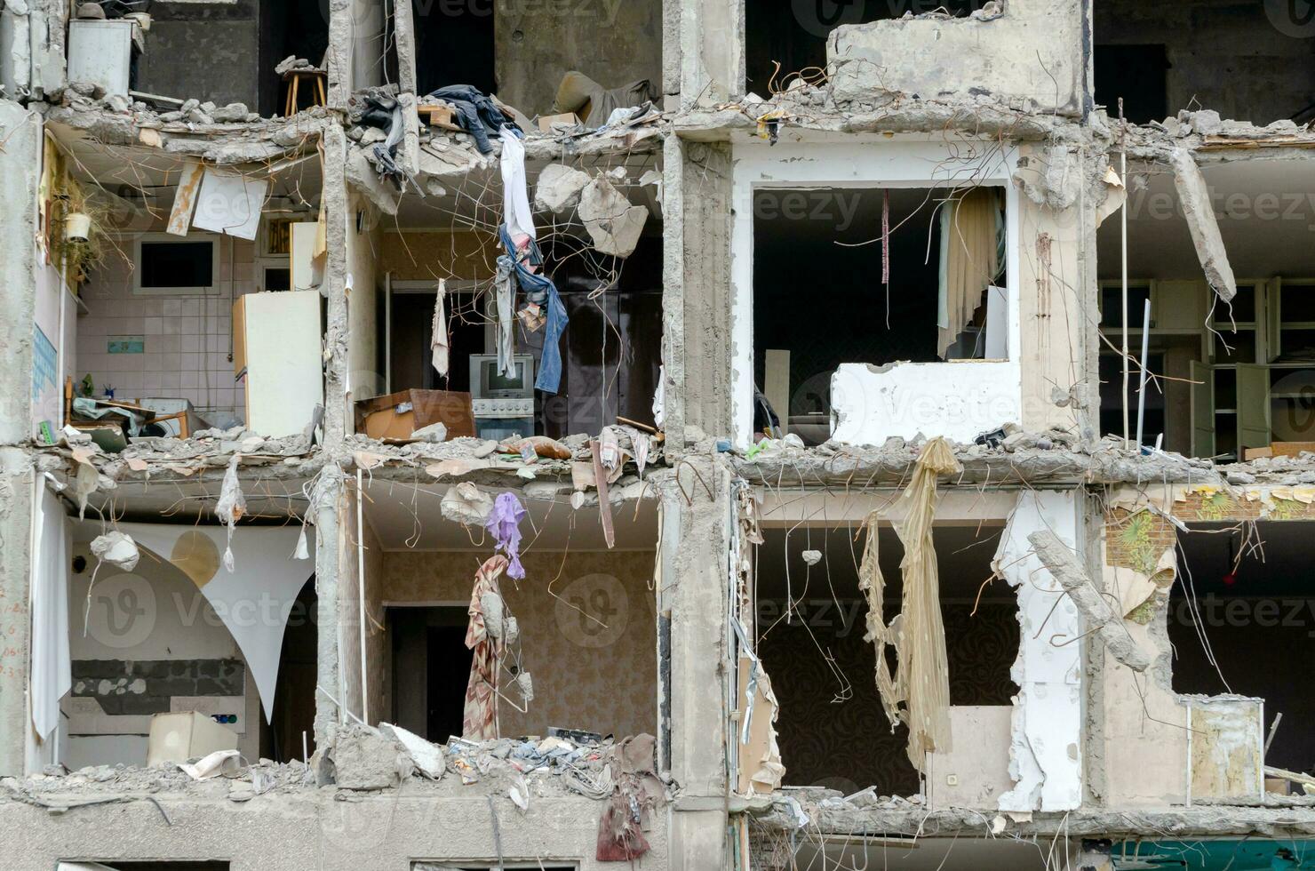 destroyed and burned houses in the city during the war in Ukraine photo