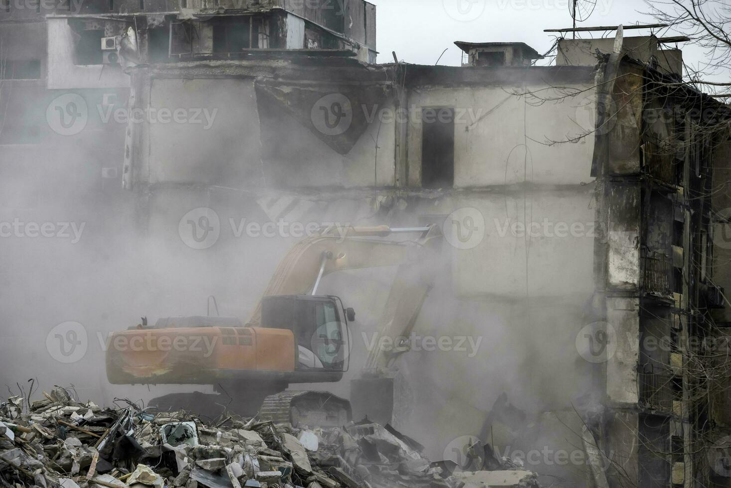 demolition of destroyed and burnt houses in Ukraine during the war photo