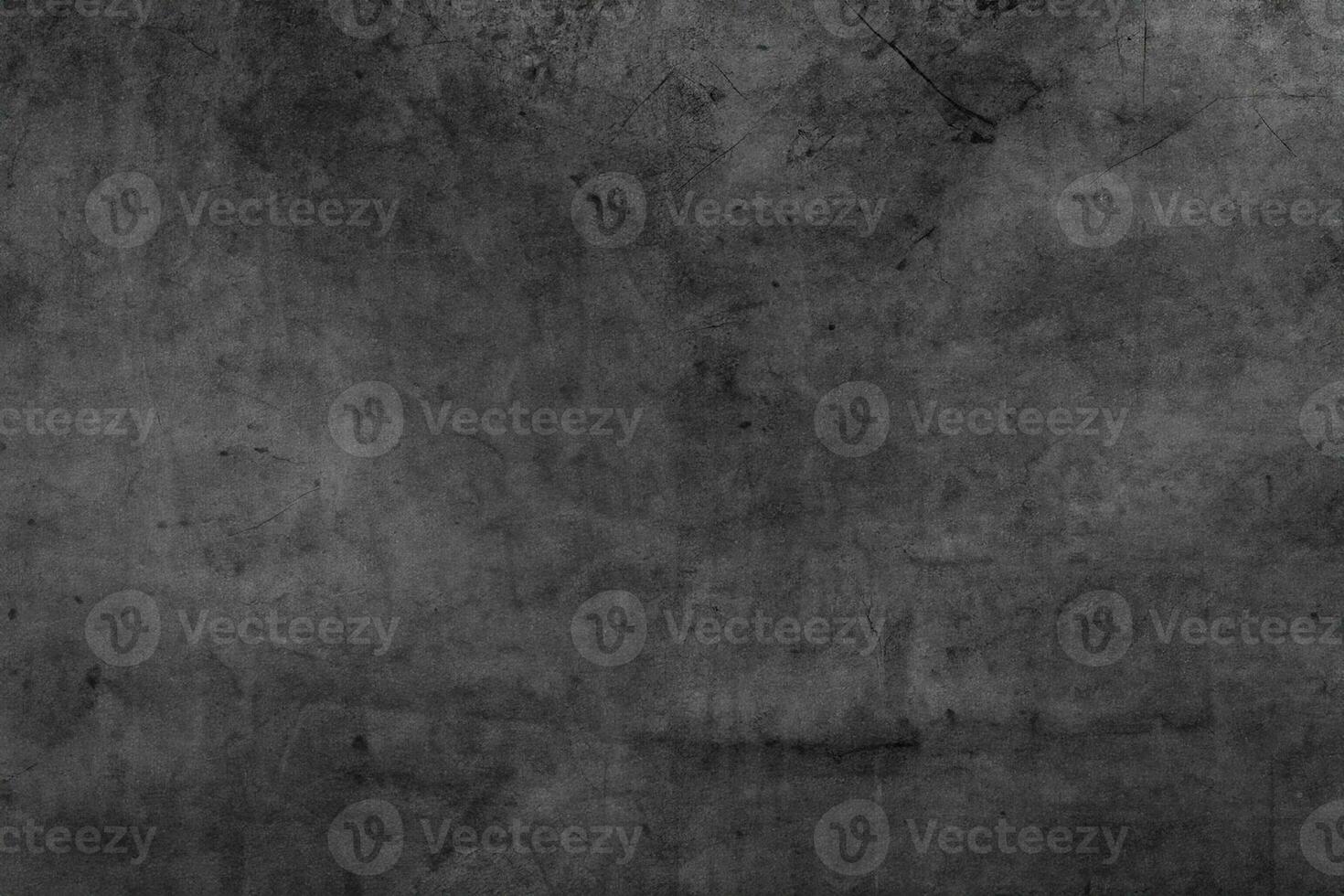 Grunge textured dark concrete wall background photo