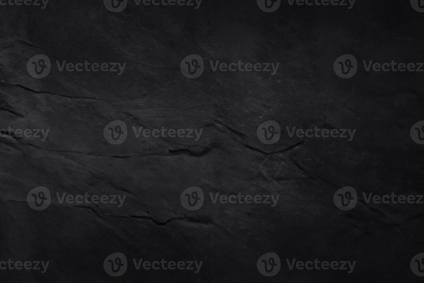 Dark grey black slate texture with high resolution, background of natural black stone wall. photo