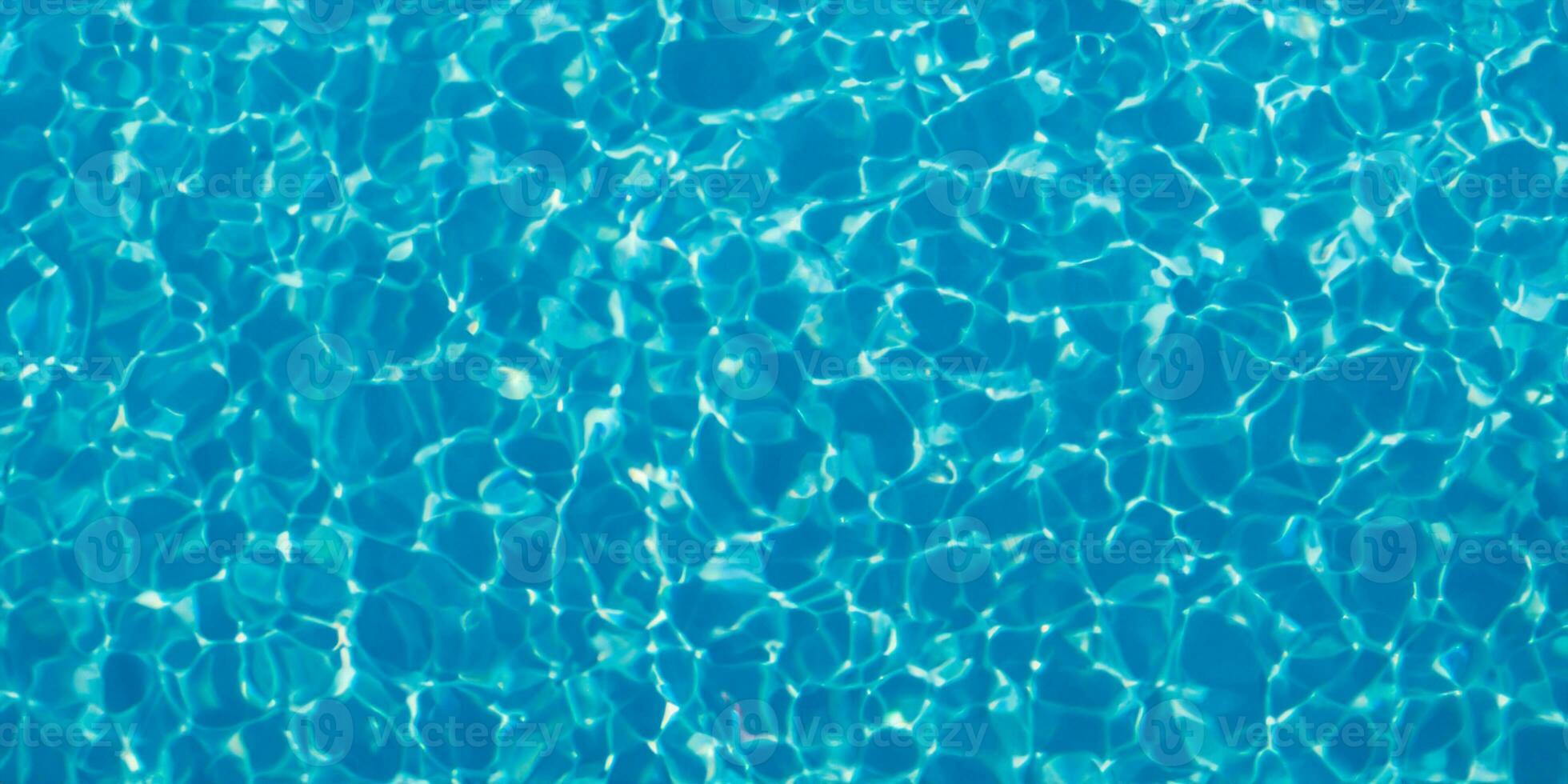 background blue ripped water in swimming pool photo