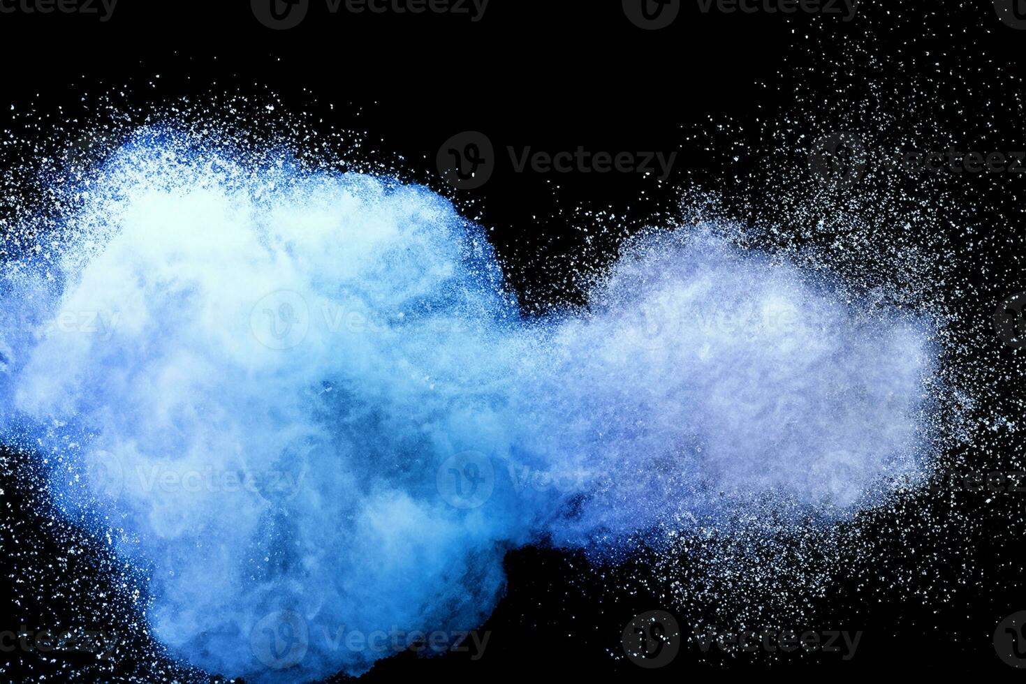 Closeup of blue dust particle splash isolated on black background. photo