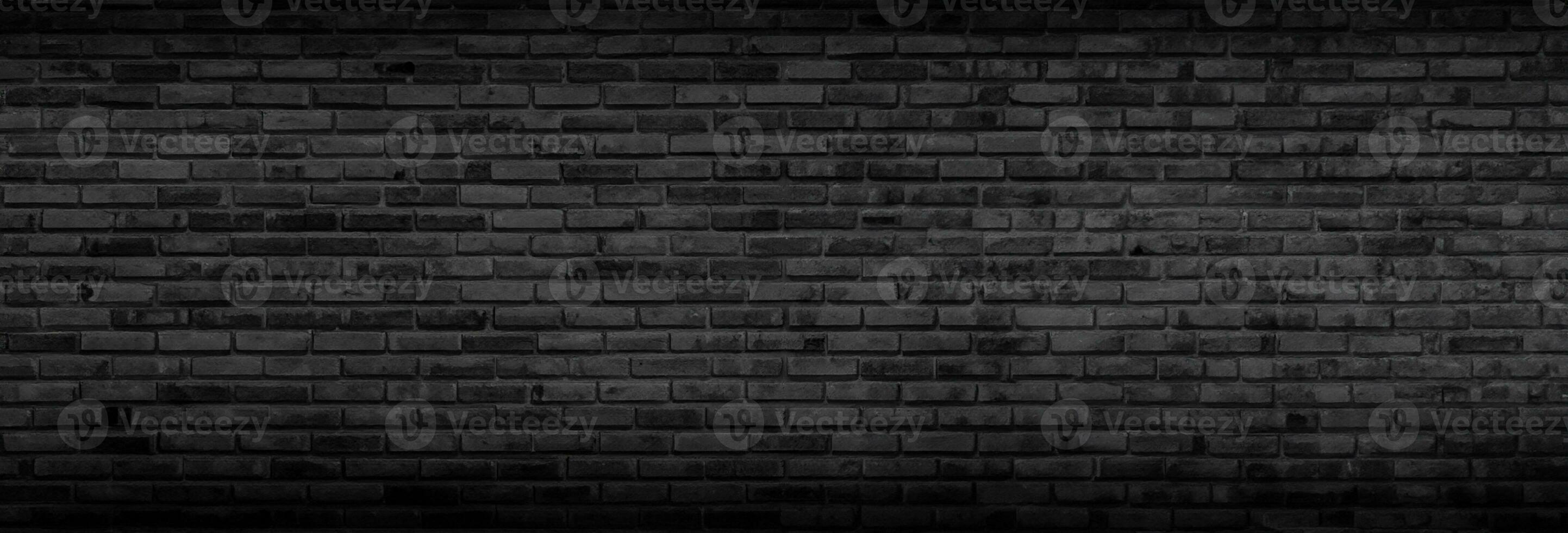 Panorama Black brick walls that are not plastered background and texture. The texture of the brick is black. Background of empty brick basement wall. photo