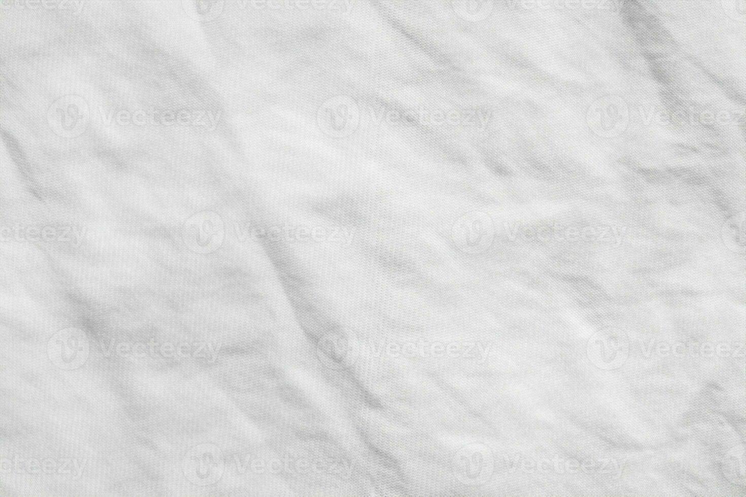 fondo de patrón de textura de tela de tela de camisa de algodón arrugado blanco foto