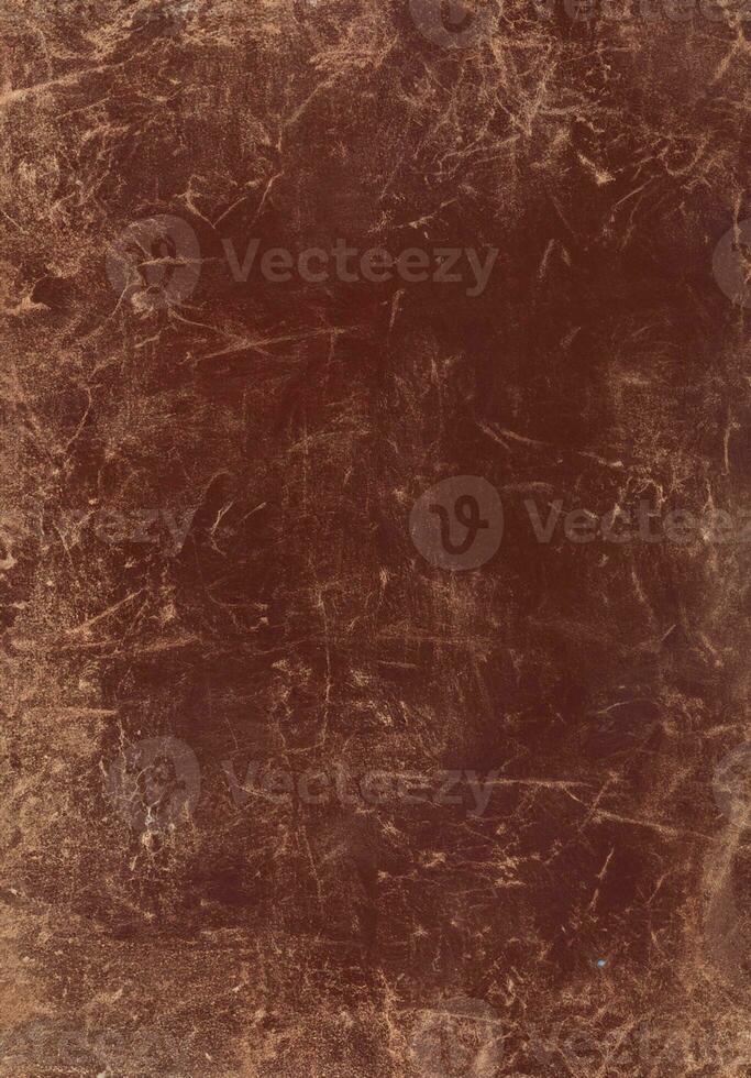 old scratched worn brown leather background and texture photo