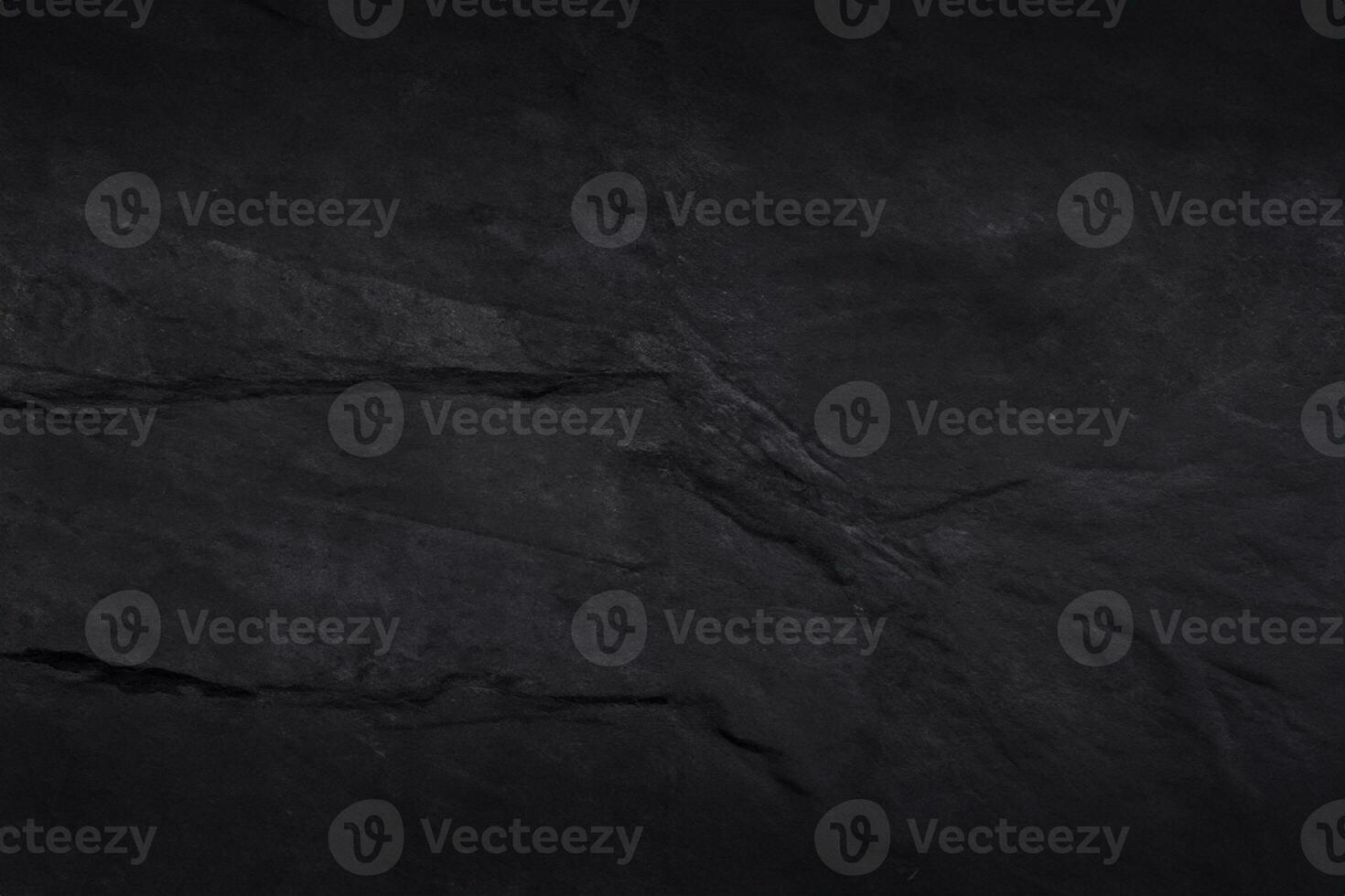 Dark grey black slate texture with high resolution, background of natural black stone wall. photo