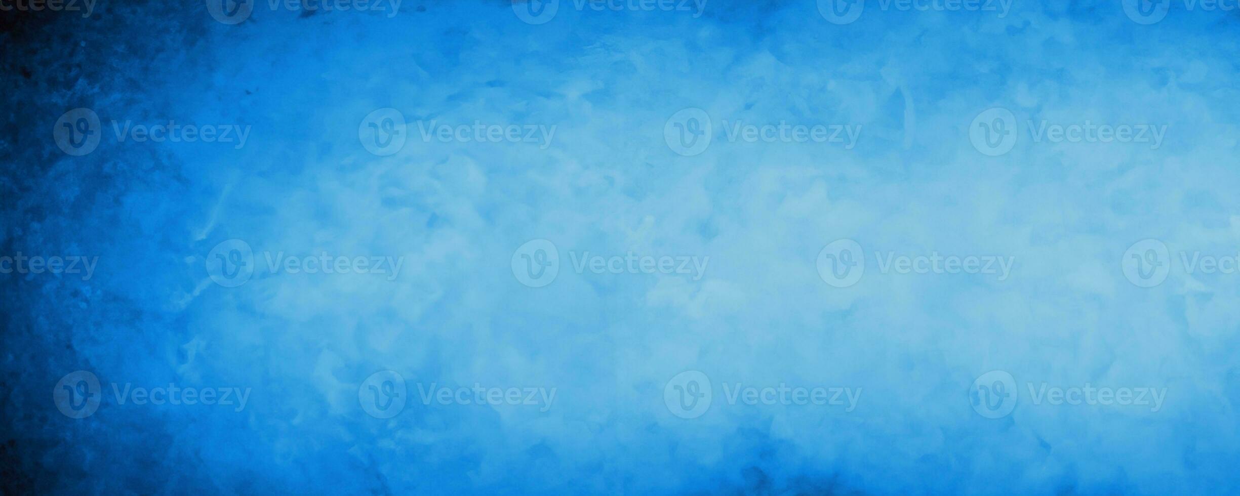 dark blue grunge cement wall background. photo