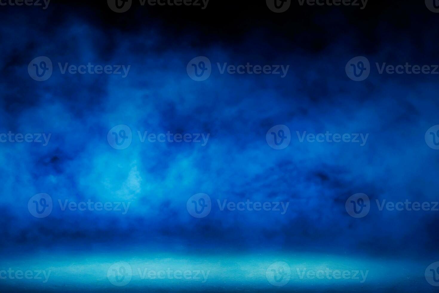 Empty space studio dark room with blue lighting effect and fog in black background. photo