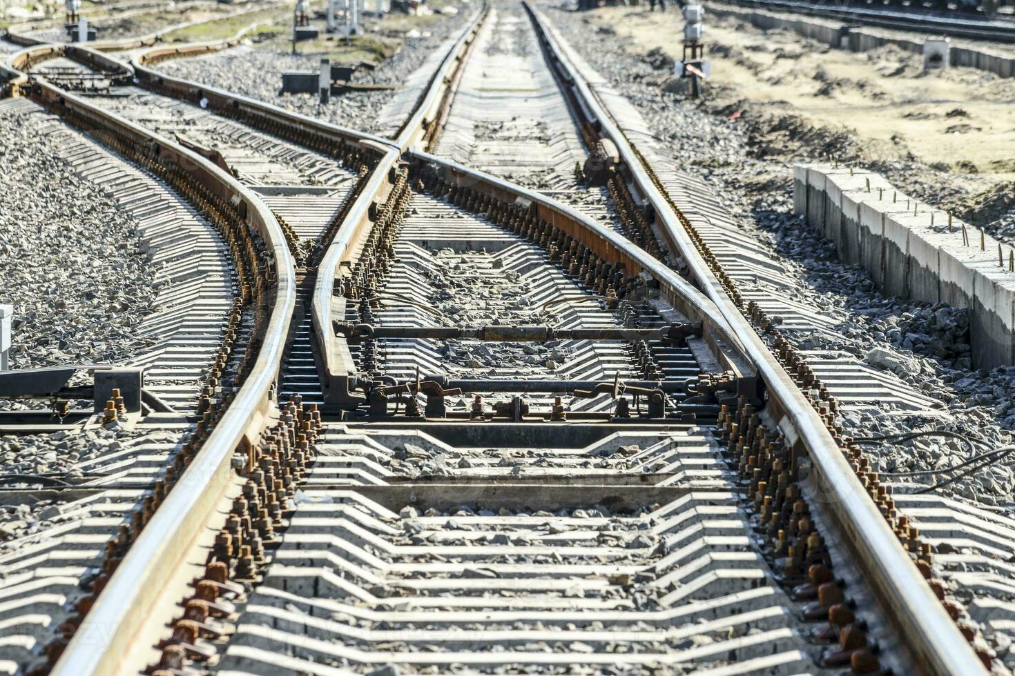 Railroad tracks at the train station photo