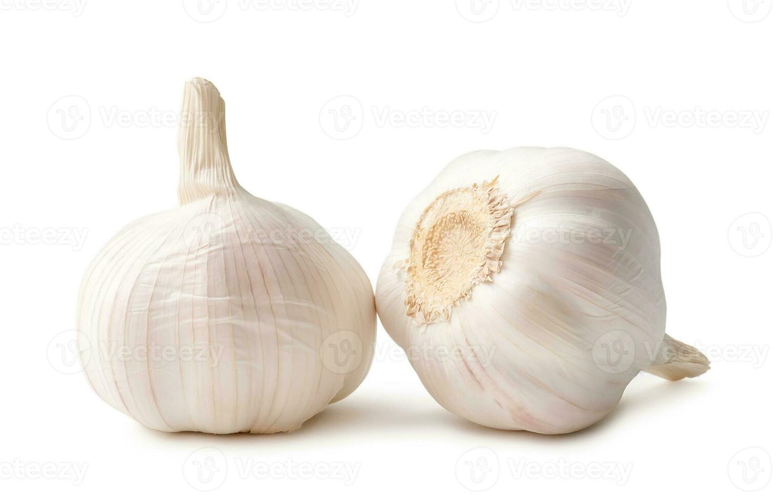 Front view of garlic bulbs in stack isolated on white background with clipping path photo