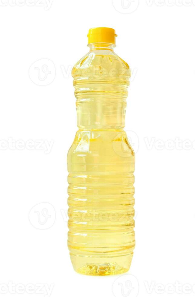 Light yellow cooking or vegetable oil in small plastic bottle isolated on white background with clipping path photo