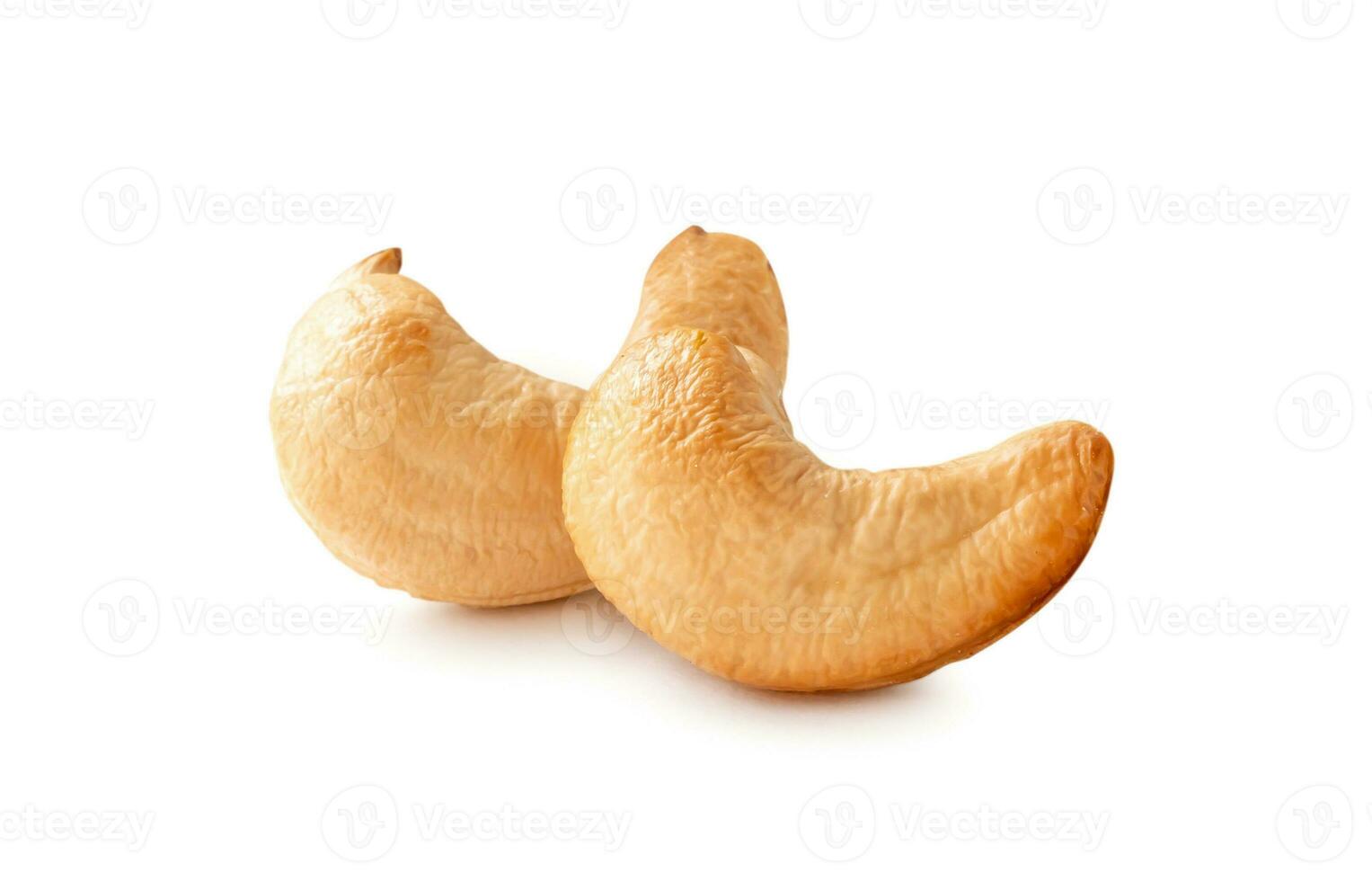 Front view of two Roasted brown cashew nuts in stack isolated on white background with clipping path photo