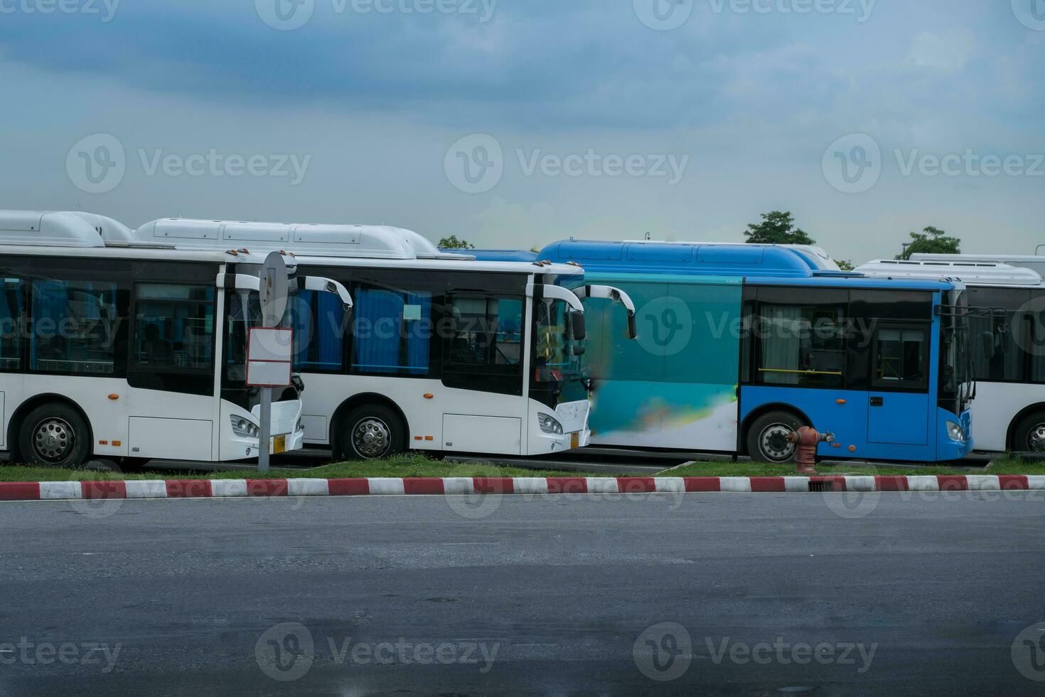 Bus stop at station in terminal photo