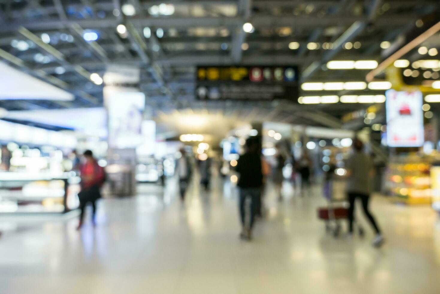 Blur of duty free shop in terminal building of airport photo
