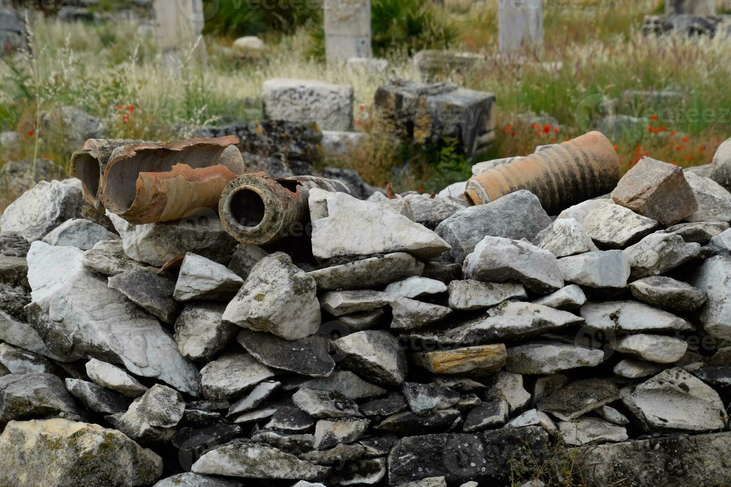 remains of ancient ceramic pipes from the water supply. Prefabricated sections of ceramics from which the pipeline was assembled. photo