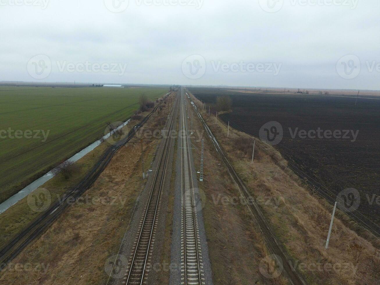 Plot railway. Top view on the rails. High-voltage power lines for electric trains photo