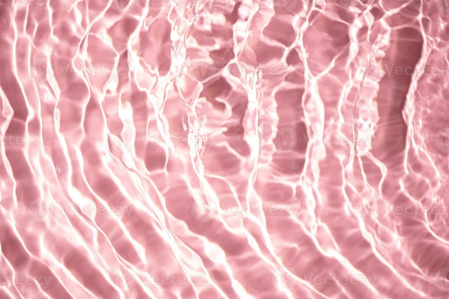 hermosa agua textura con ondas. rosado color, agua antecedentes foto