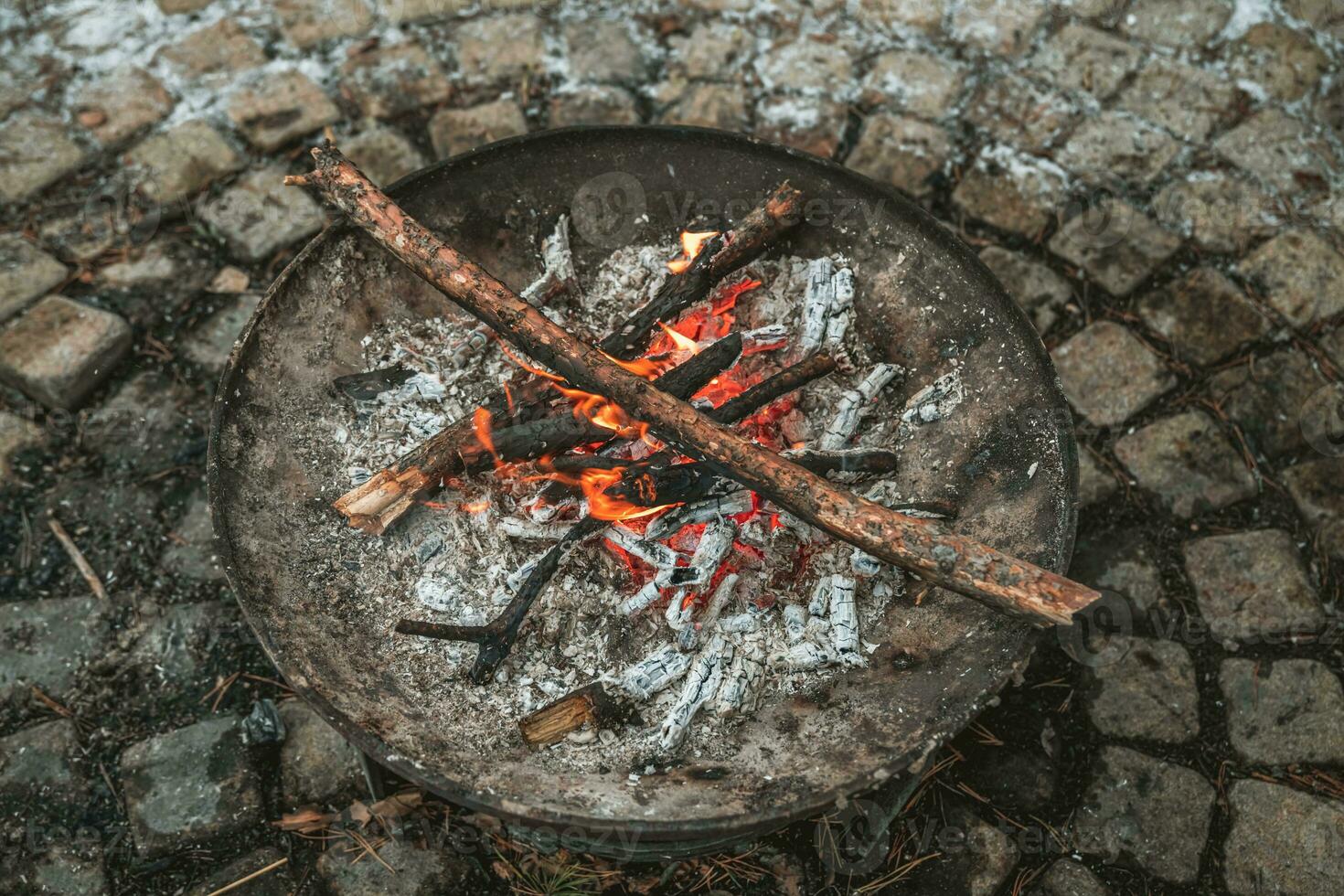 fire campfire bowl outdoors in winter. cozy atmosphere photo