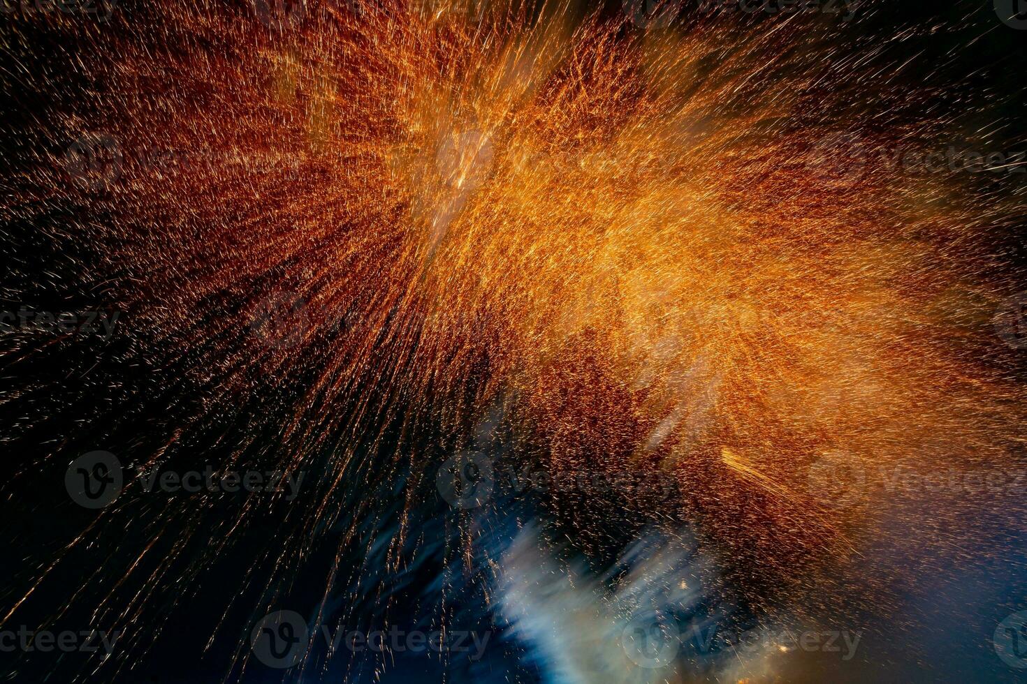 fireworks on the river in the dark sky photo