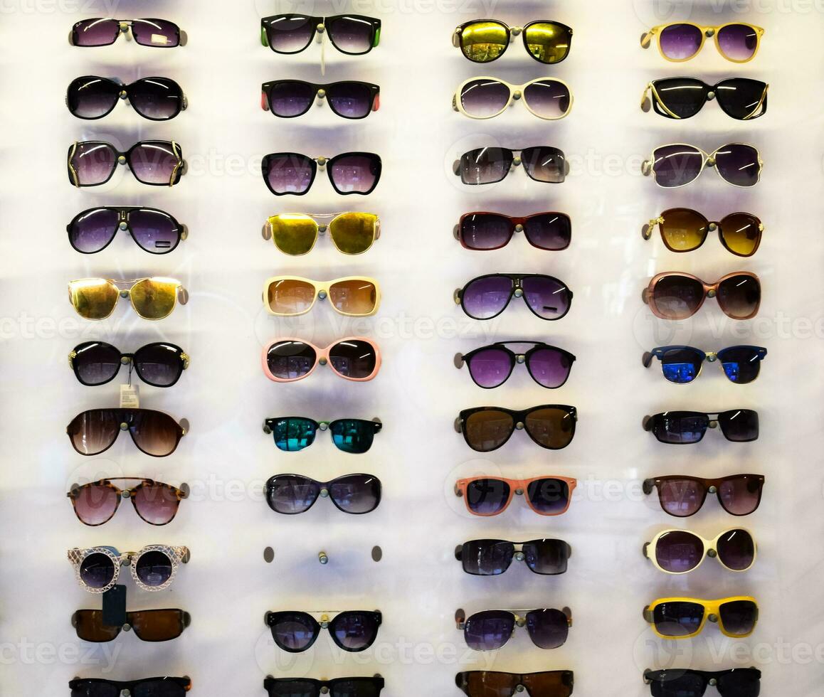 Sunglasses on the shop window photo