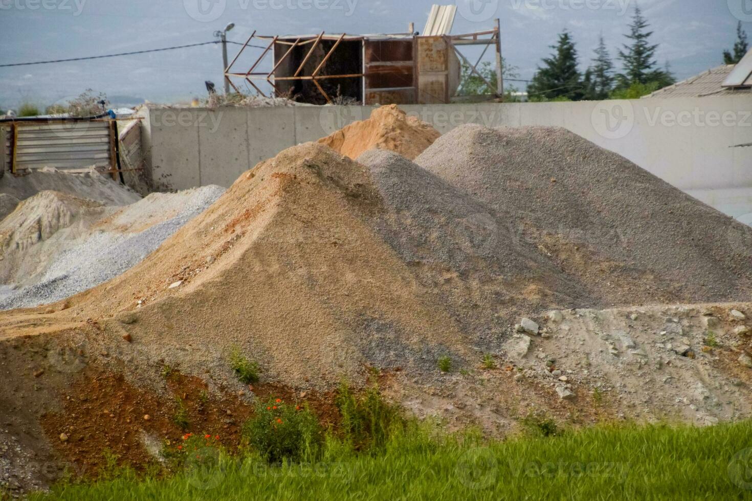 Pile of crushed stone at construction site photo