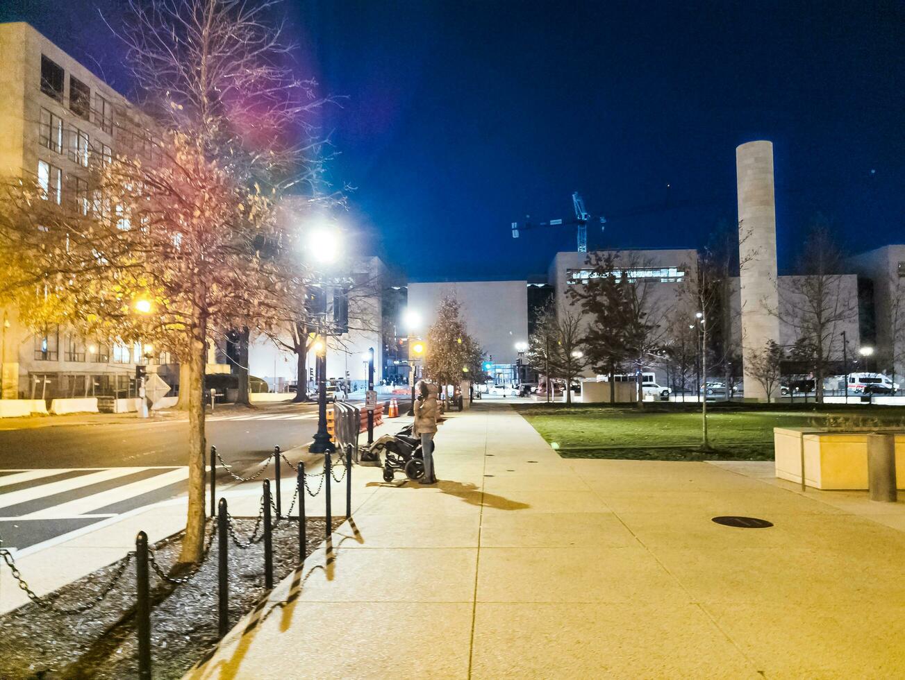 Washington, D.C. US - 12.12.2023 The streets of Washington in the evening near the Department of Education and the Dwight Eisenhower Memorial photo