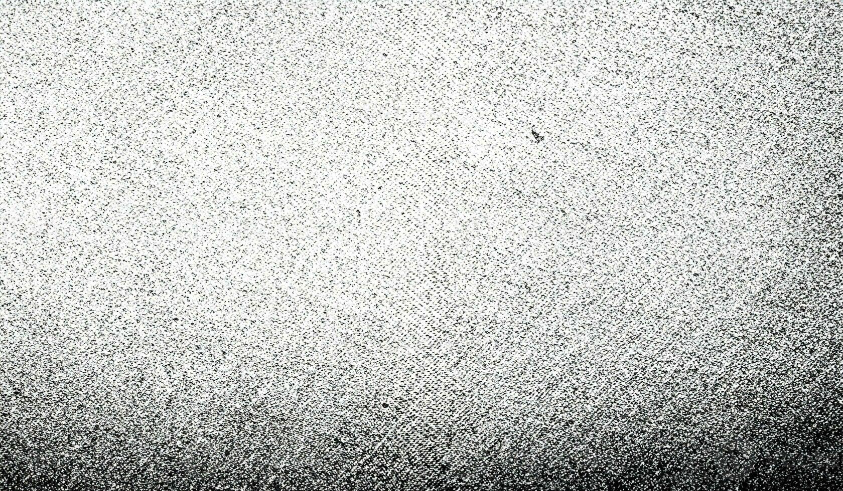 Subtle halftone grunge urban texture. Distressed overlay texture. Grunge background. Abstract mild textured effect. Black isolated on white. photo