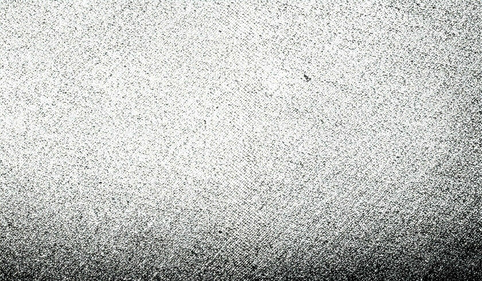 Subtle halftone grunge urban texture. Distressed overlay texture. Grunge background. Abstract mild textured effect. Black isolated on white. photo