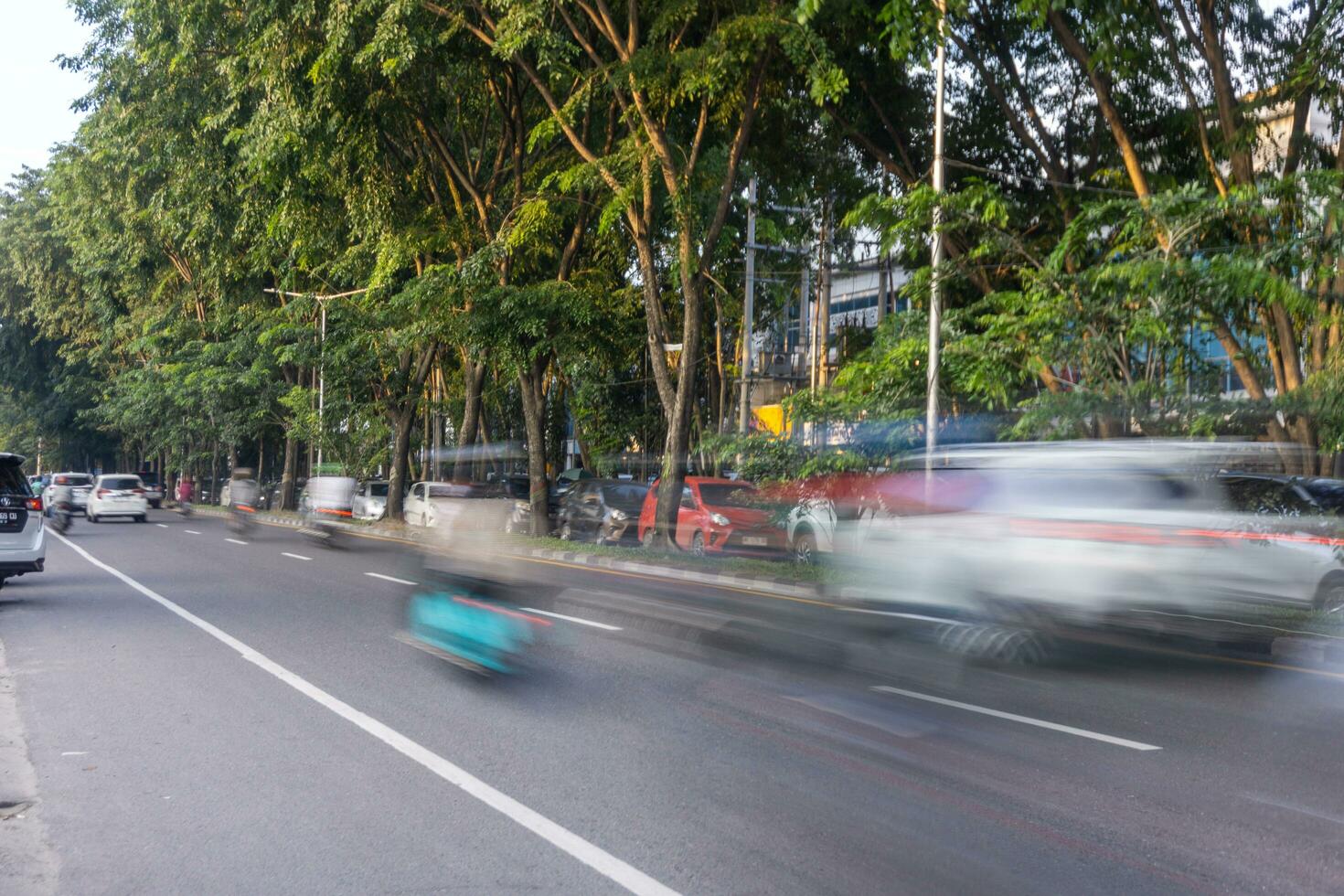 City traffic motion blur. Blurred traffic in medan city north Sumatera photo