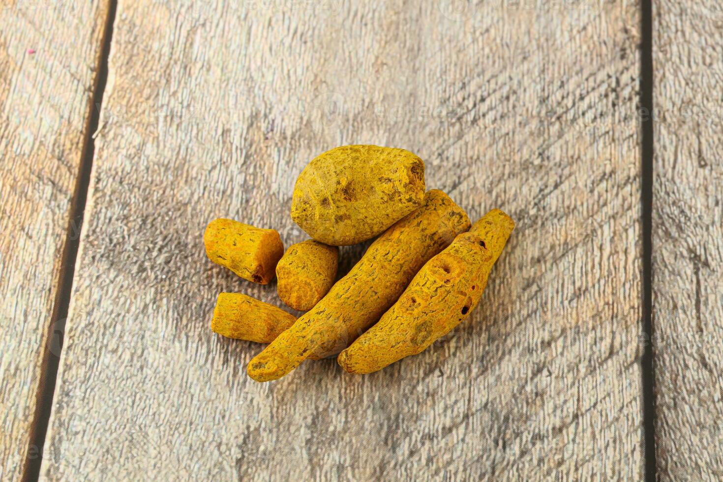 Indian spices - Turmeric root Curcuma photo