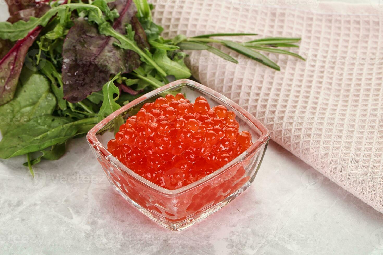 Red caviar in the bowl photo