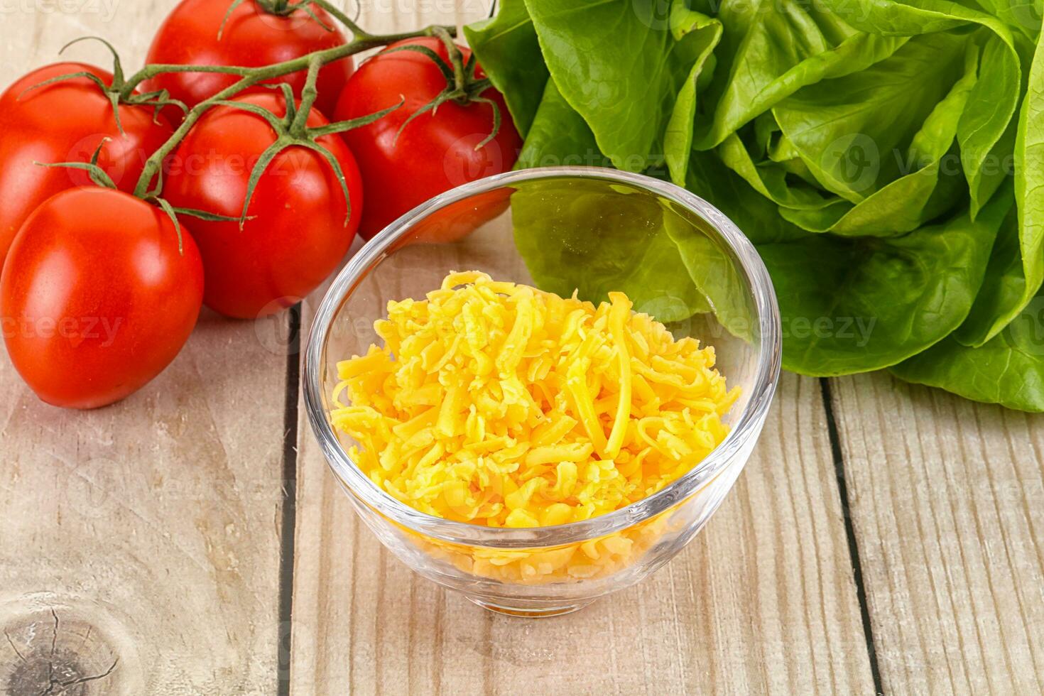 Shredded cheese in the bowl photo