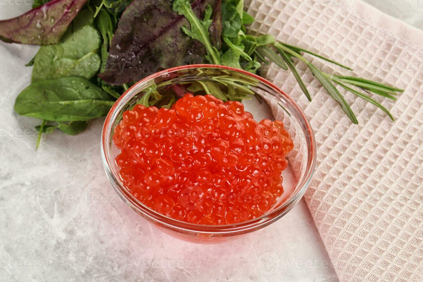 Red caviar in the bowl photo