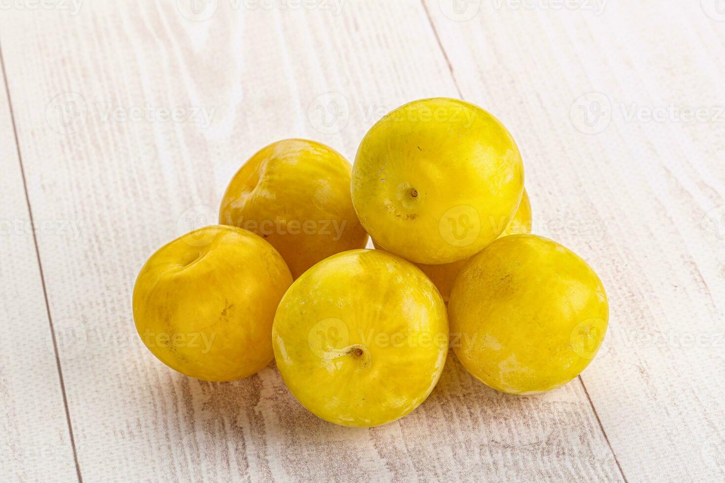 Yellow sweet plum heap fruit photo