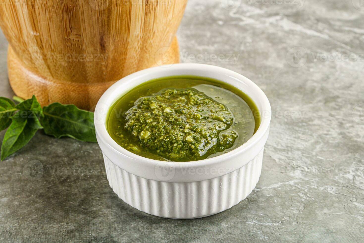 Homemade vegetarian basil pesto sauce photo