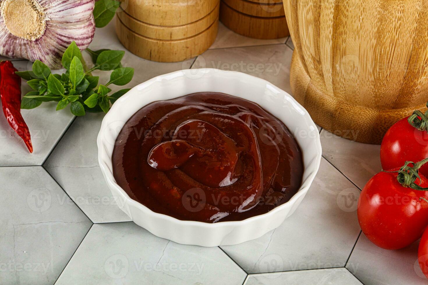 Tasty barbecue sauce in the bowl photo