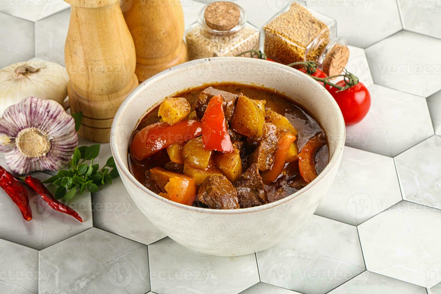 Homemade beef hungarian goulash with potato photo