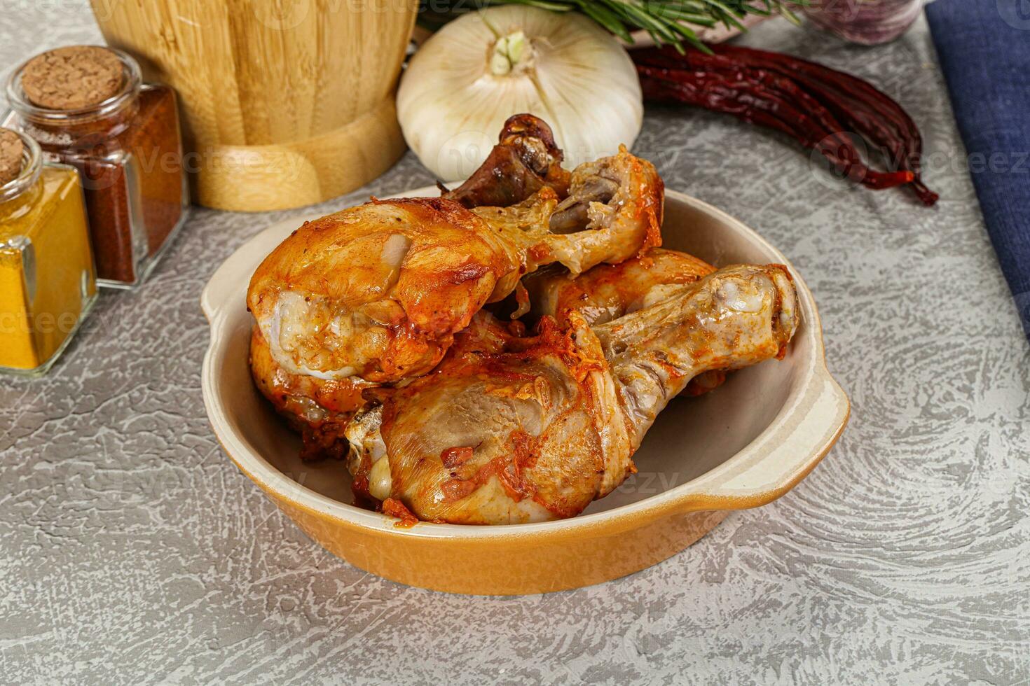 Raw marinated chicken drumstick for cooking photo