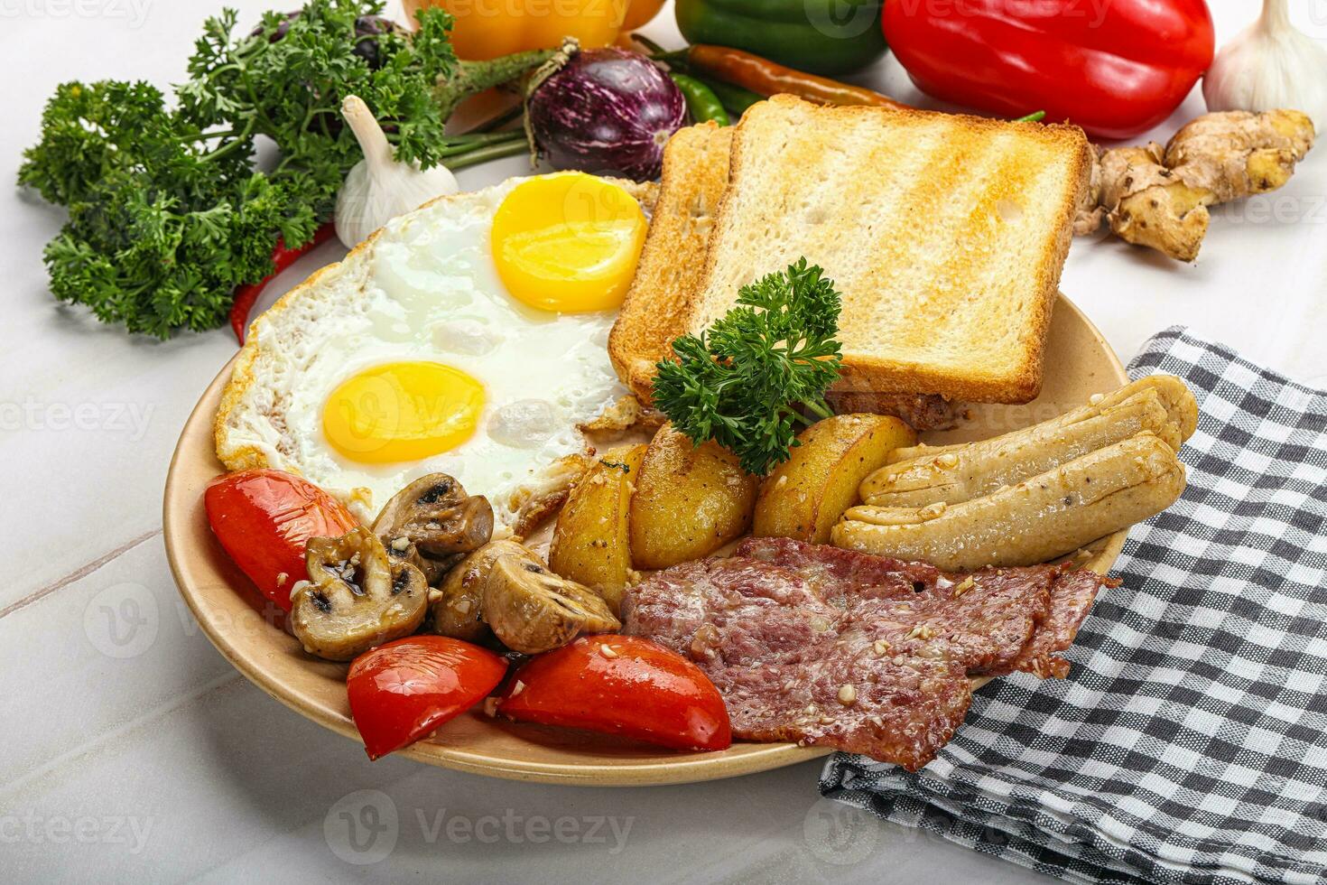 English breakfast with toast, egg and sausages photo