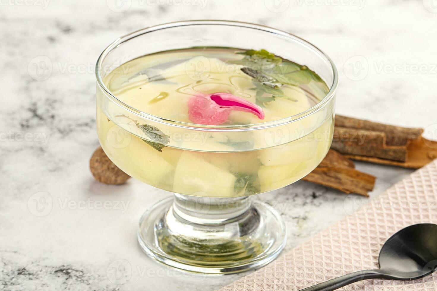 Sweet pineapple jelly with mint photo
