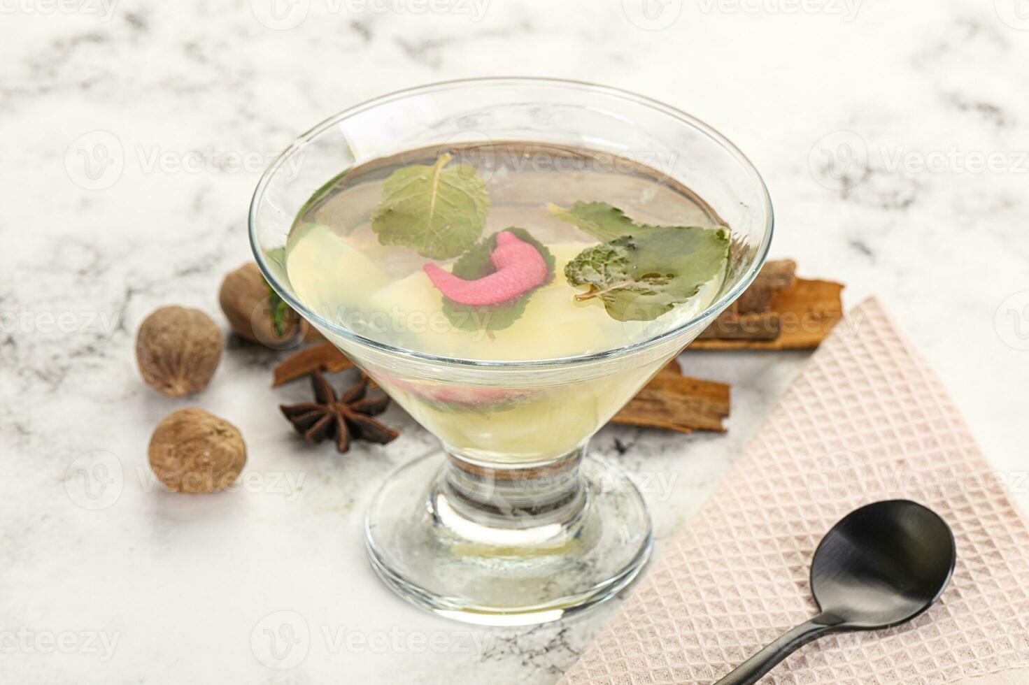 Sweet pineapple jelly with mint photo